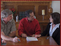 Dr. Cole assisting couple in mediation