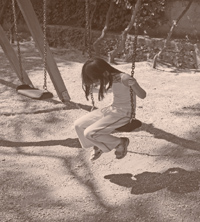 lonely girl on swing