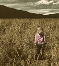 wandering and lost child in a field